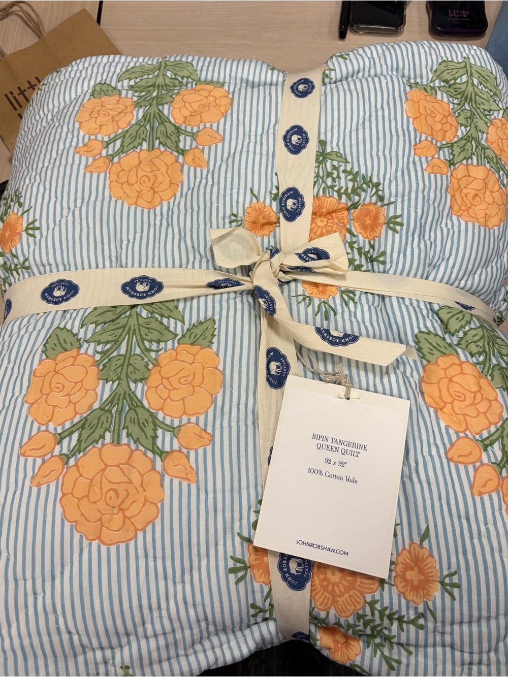 John Robshaw Tangerine Floral Quilt in Orange and Light Blue Stripe